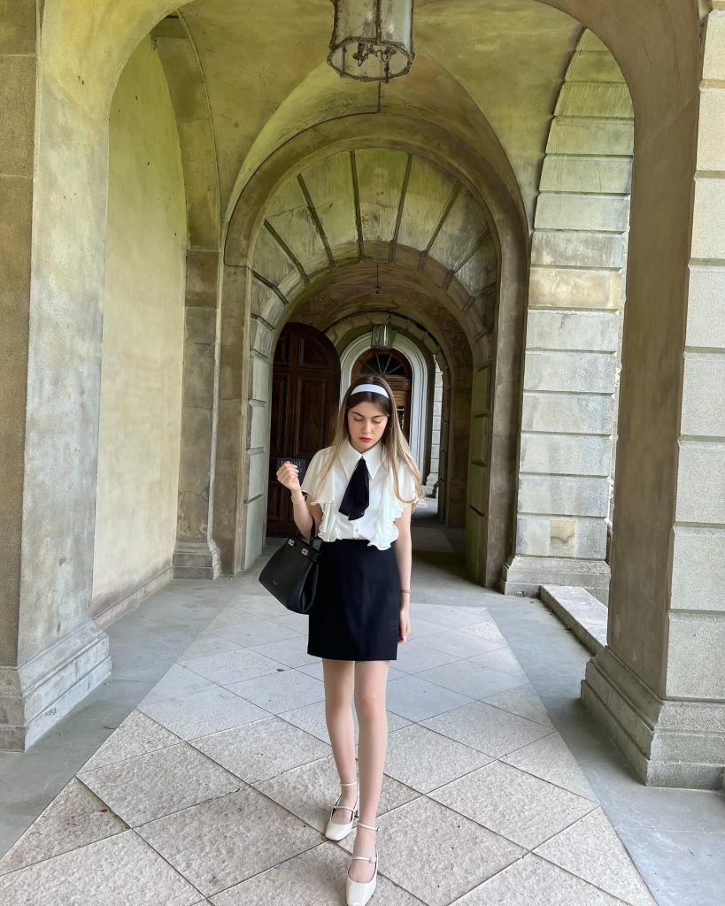 White Ruffle Blouse + Black Mini Skirt + Contrast Neck Tie