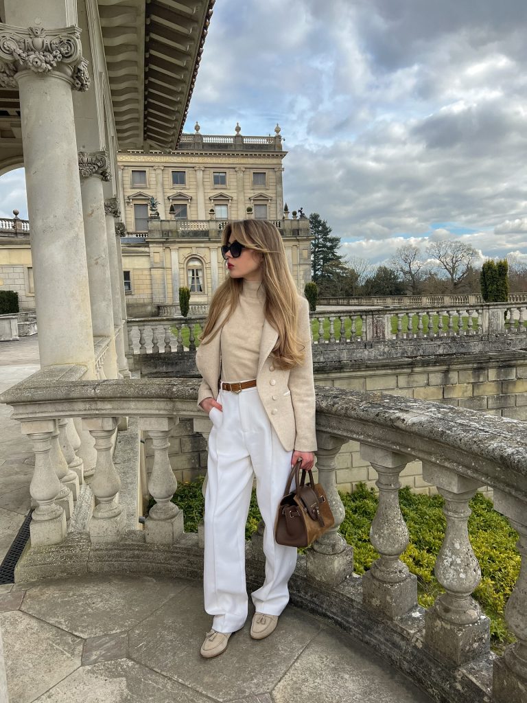 Beige Blazer + Turtleneck Top + White Pleated Trousers