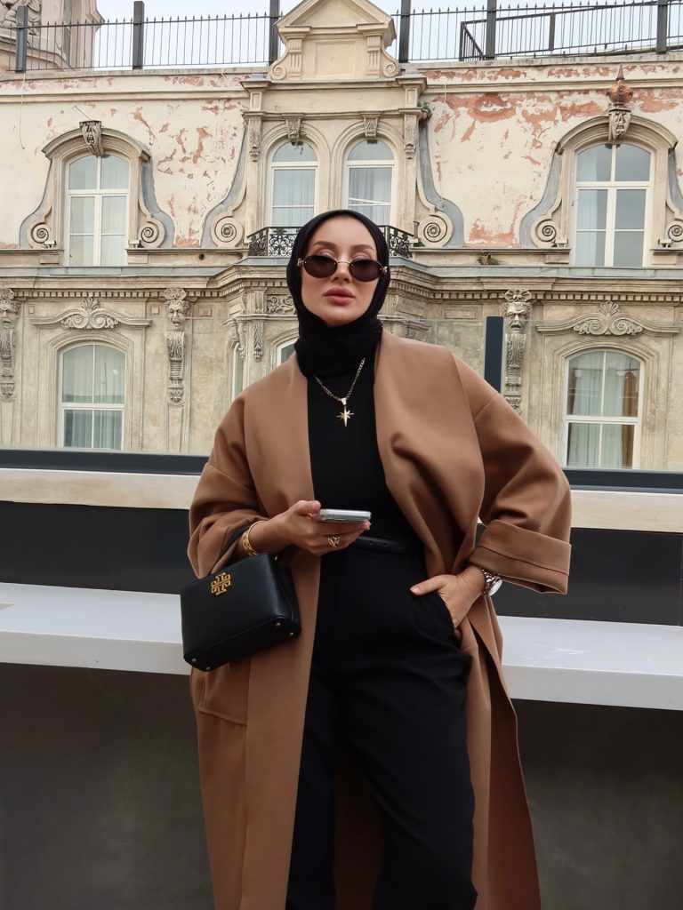 Tan Oversized Coat + Black High-Waisted Trousers + Gold Star Pendant