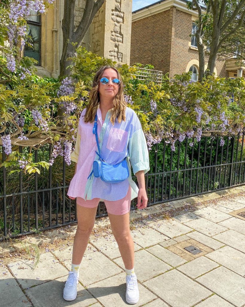 Multi-color Pastel Button-down + Pink Biker Shorts + Blue Crossbody Bag