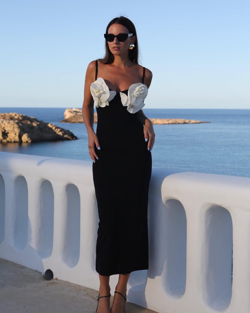 Black Maxi Dress + White Floral Appliqués + Sunglasses