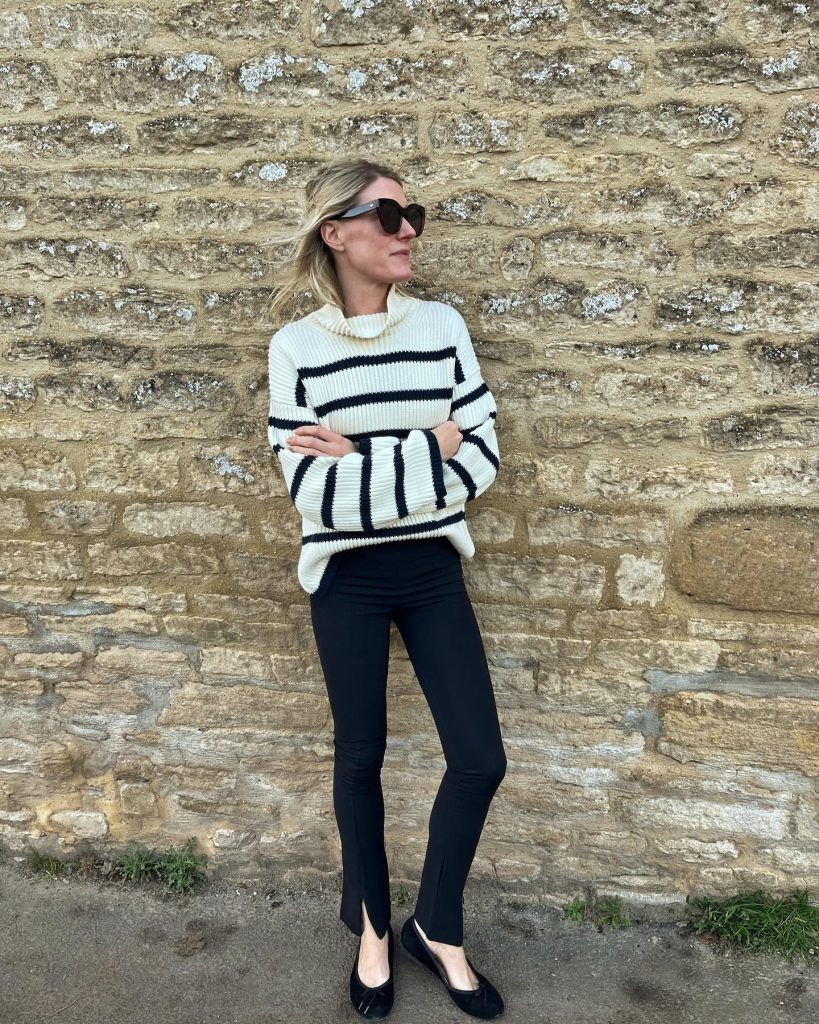 Striped Roll-Neck Sweater + Black Split-Hem Leggings + Black Ballet Flats