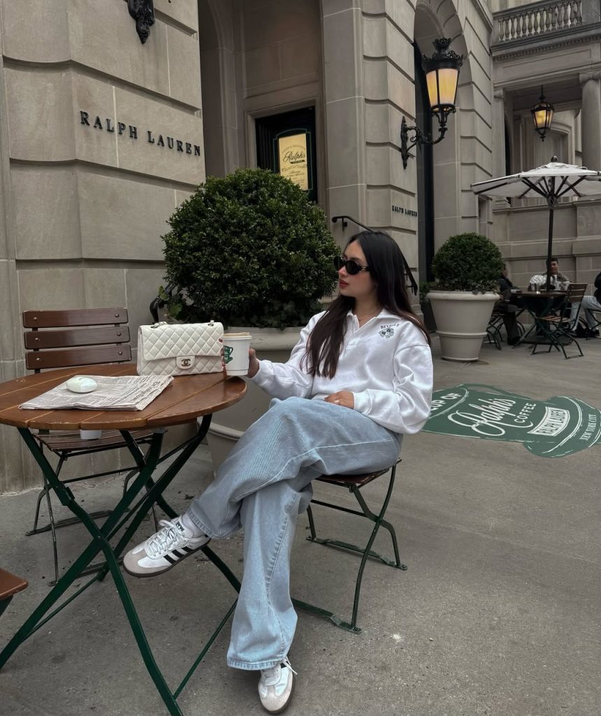 White Pullover + Light Wash Jeans + Quilted Bag