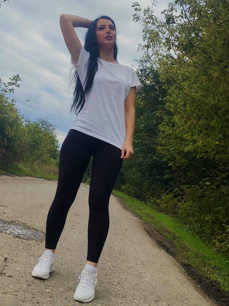 White Oversized Tee + Classic Black Leggings + White Athletic Shoes