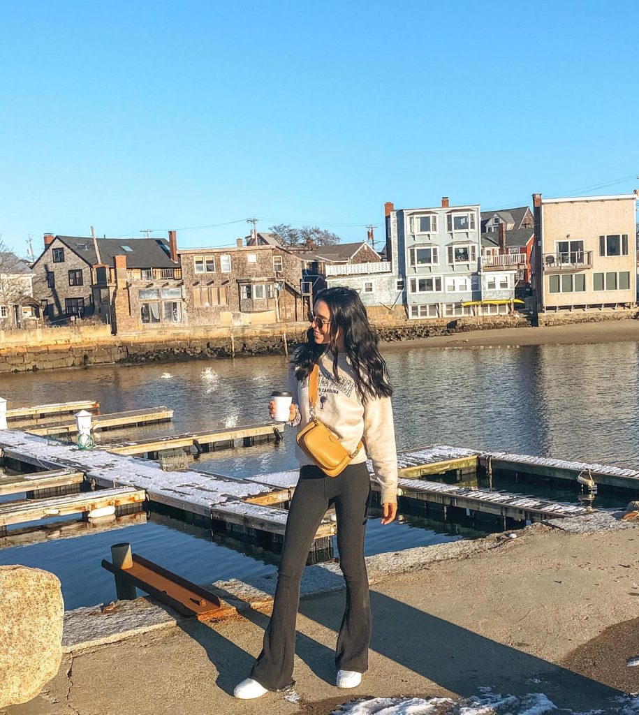Cream Crewneck Sweater + Dark Wash Denim Flare Pants