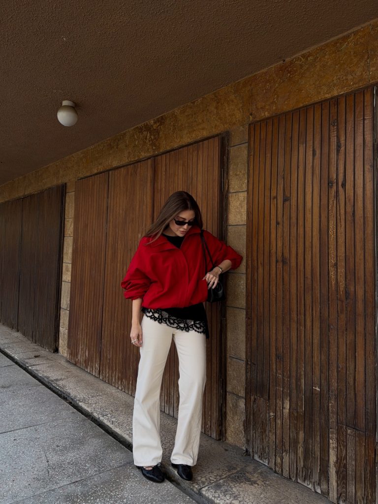 Red Zip-Up Jacket + Black Lace-Trim Top + Off-White Trousers