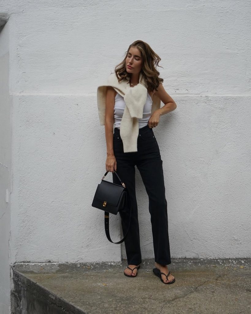 White Tank Top + Black Jeans + Shoulder Sweater
