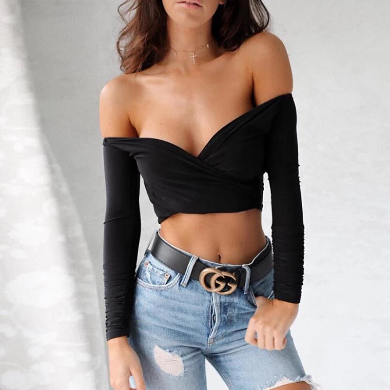 Black Wrap Crop Top + Distressed Blue Jeans + Gold Buckle Belt