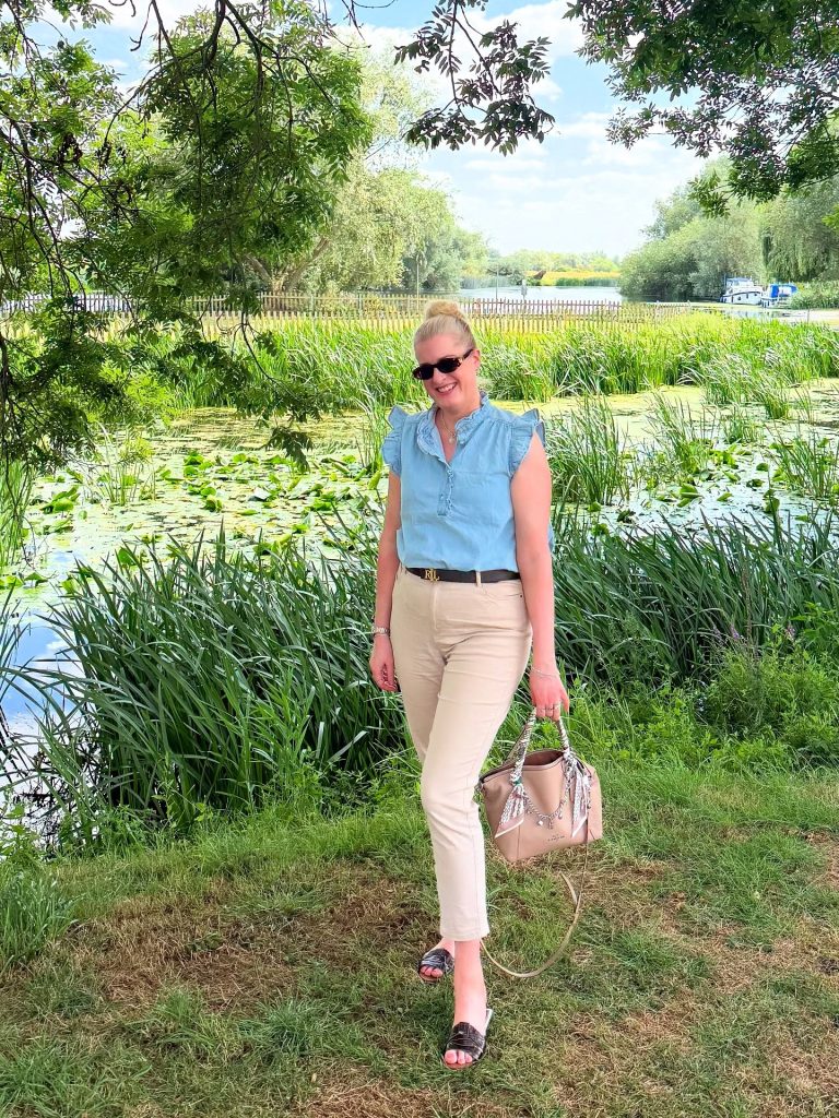 Light Blue Ruffle Denim Top + Khaki Skinny Pants + Leather Slides
