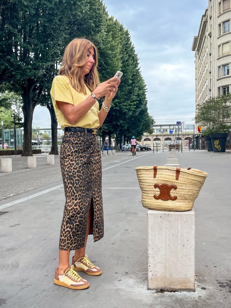 Yellow T-Shirt + Leopard Print Midi Skirt + Athletic Sneakers