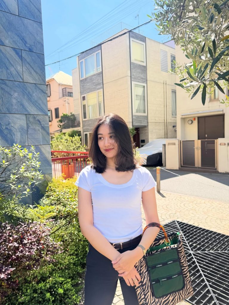 White Scoop Neck T-Shirt + Dark Tailored Trousers + Zebra Print Tote Bag