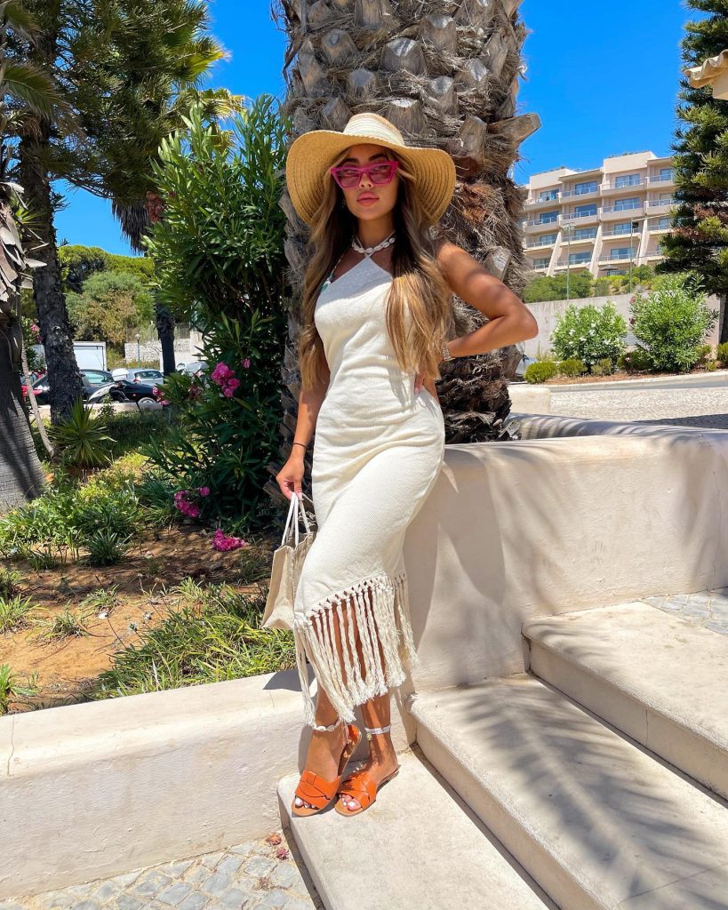 Cream Halter Fringe Dress + Wide-Brim Straw Hat + Tan Slide Sandals