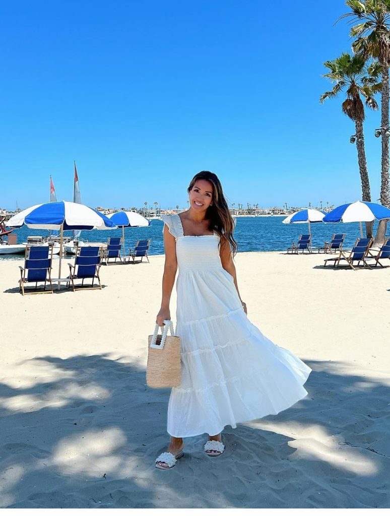 White Smocked Tiered Maxi Dress + Textured Slide Sandals + Straw Tote Bag