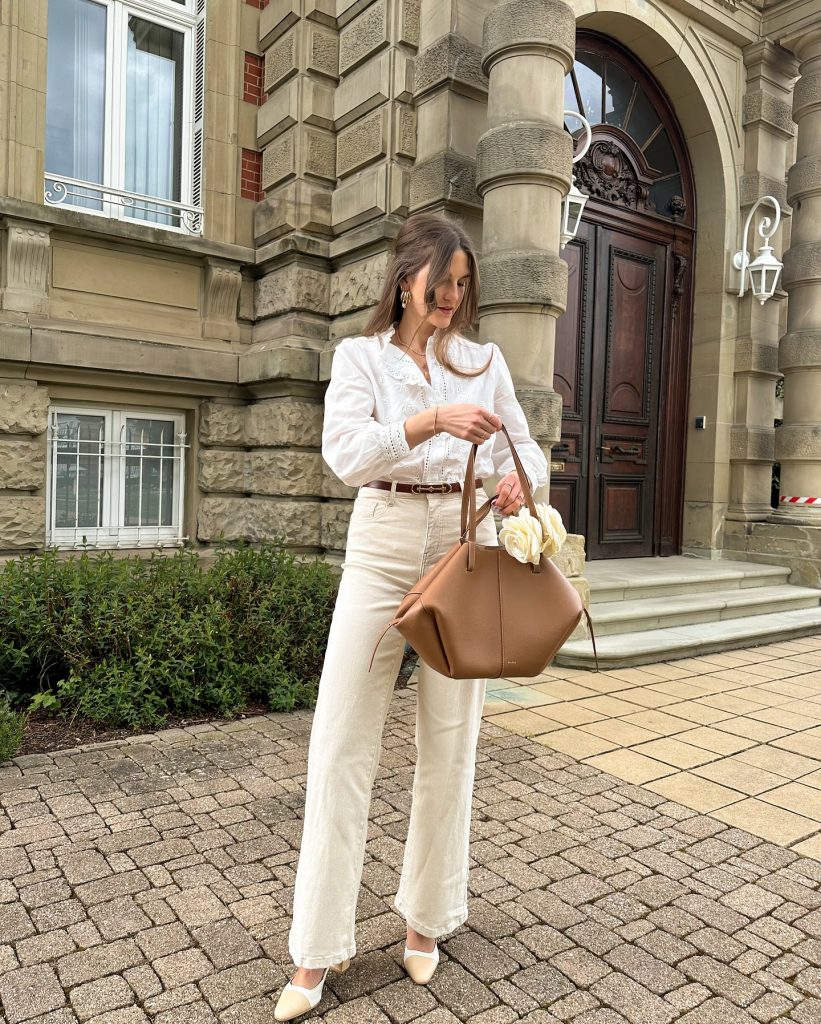 White Ruffle Blouse + Cream Wide-Leg Jeans