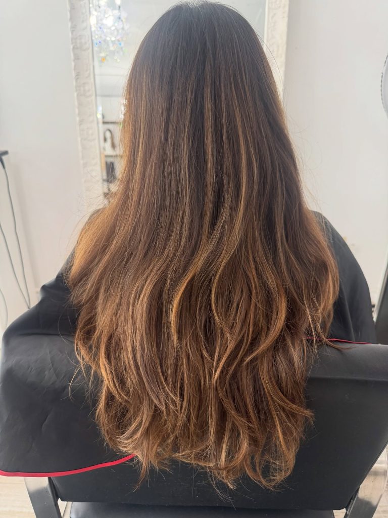 Warm Honey Brown Balayage with Face-Framing Highlights