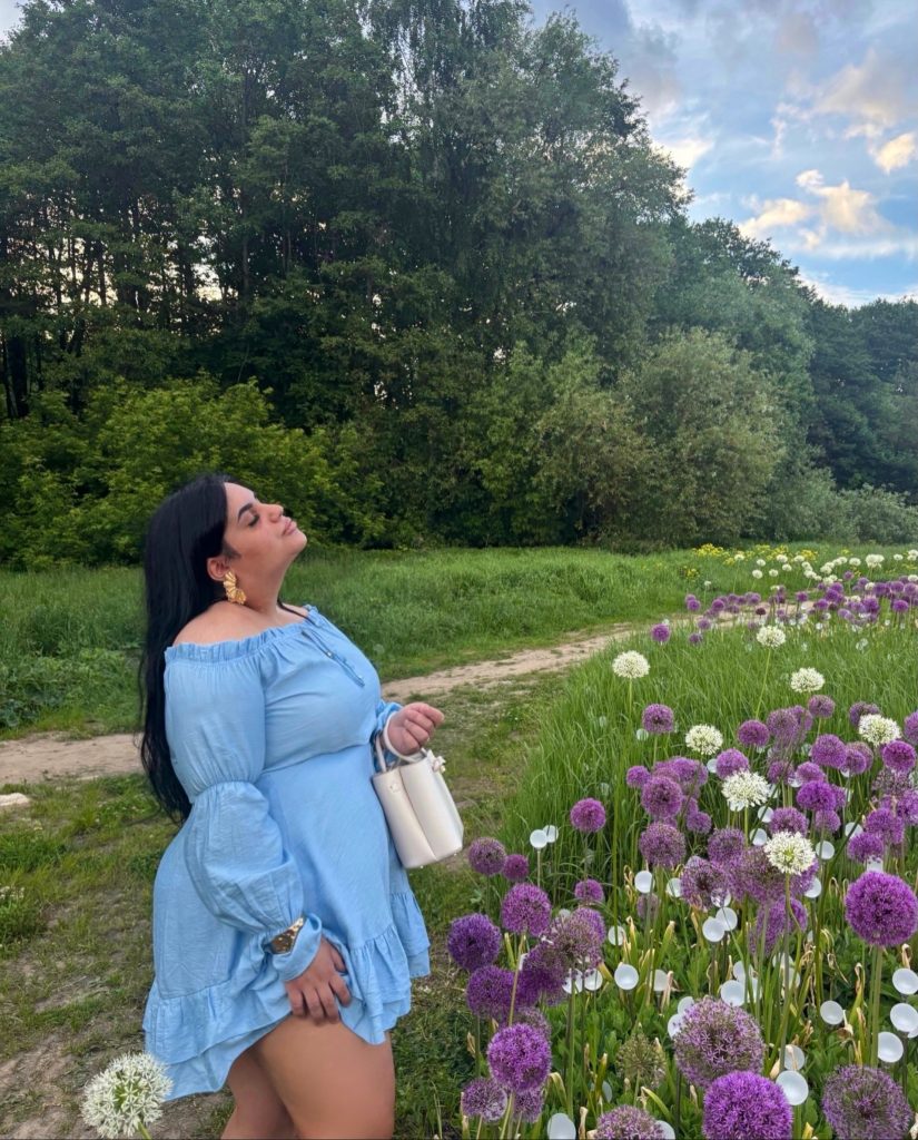 Blue Off-the-Shoulder Dress + Puff Sleeves + White Handbag