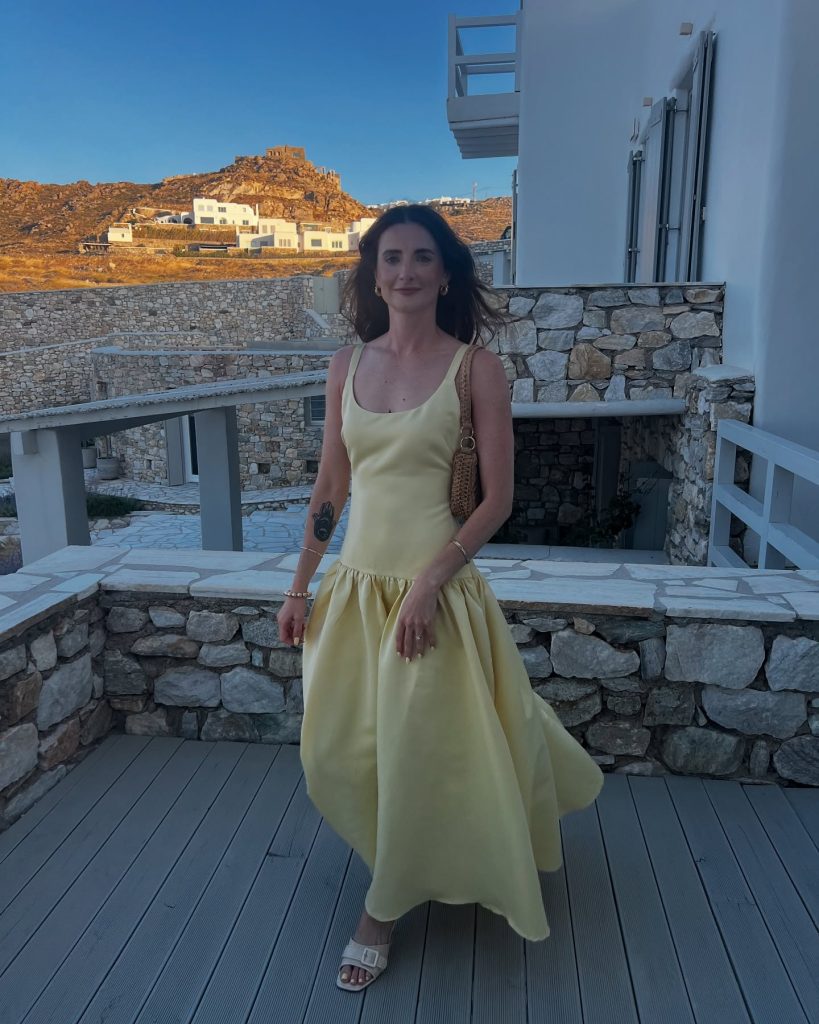 Pastel Yellow Drop-Waist Dress + Off-White Slide Sandals + Woven Shoulder Bag