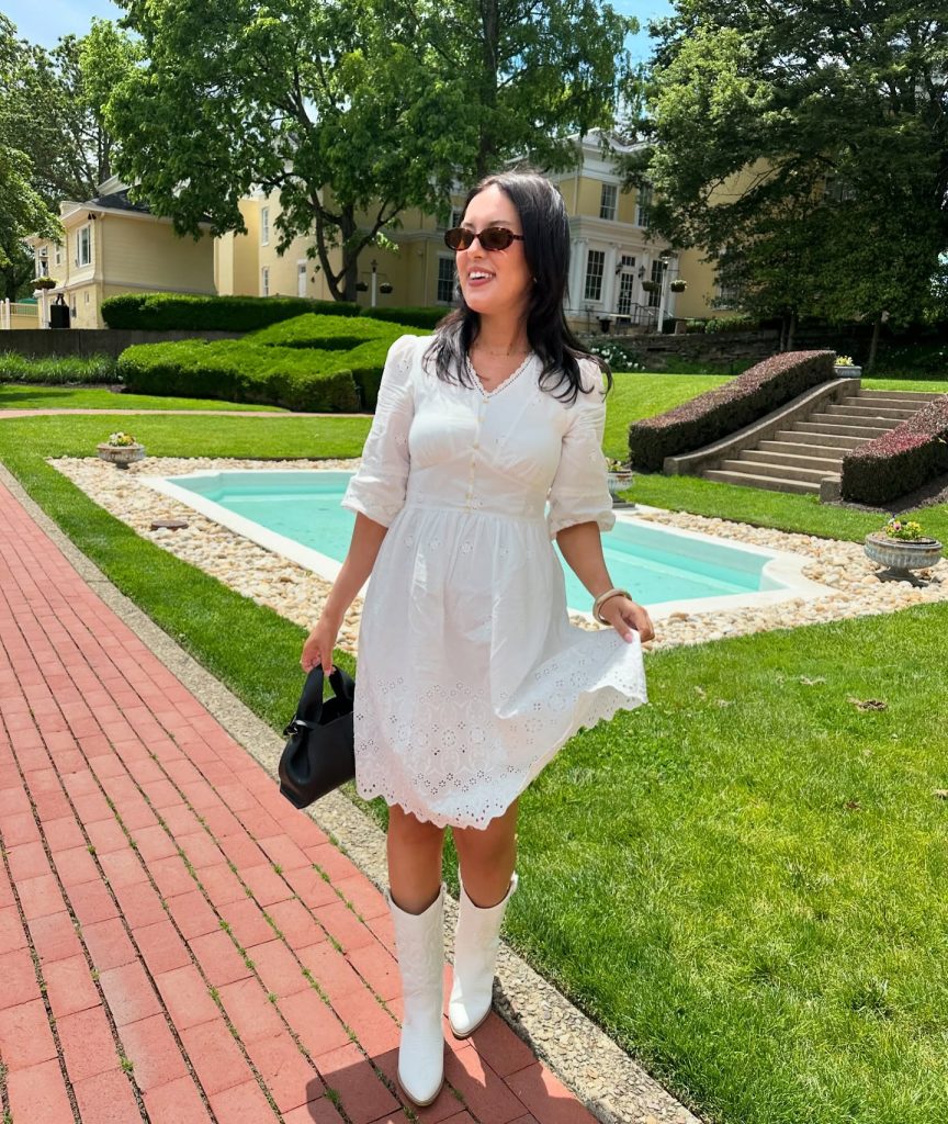 White Eyelet Dress + White Cowboy Boots + Black Handbag