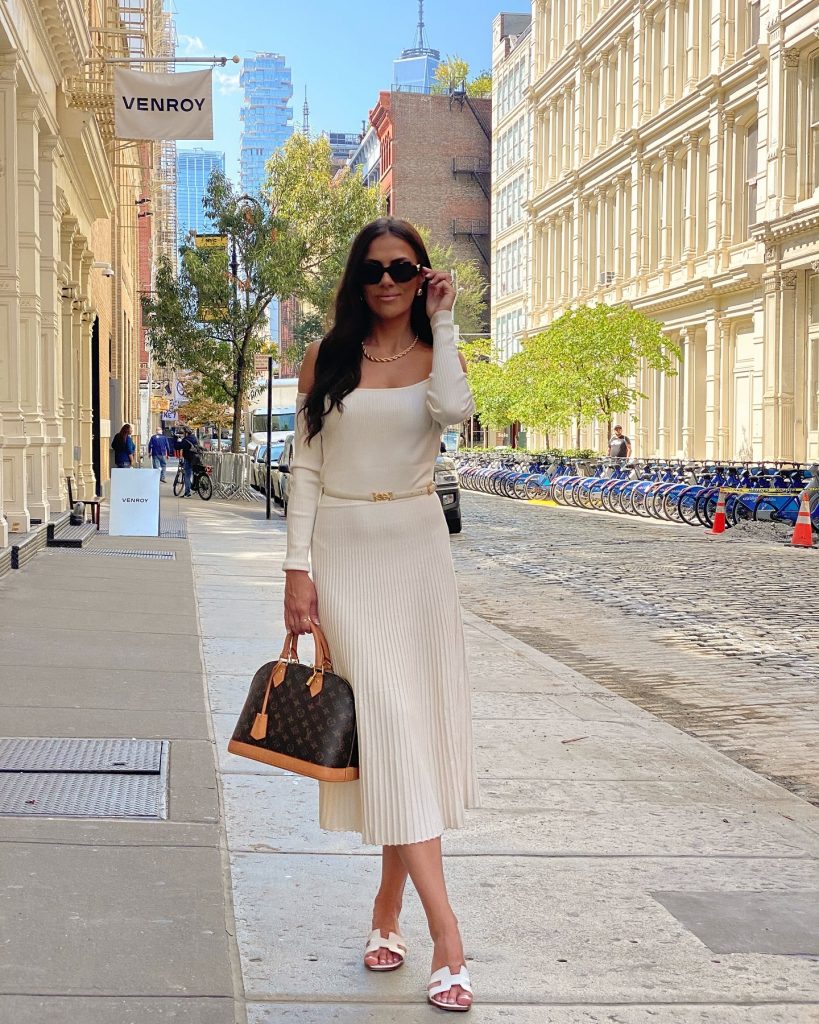 Cream Off-the-Shoulder Pleated Dress + Monogram Top-Handle Handbag + White Slide Sandals