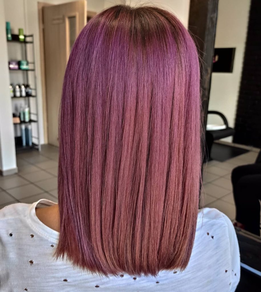Vibrant Pink Highlights for a Bold Brunette Look