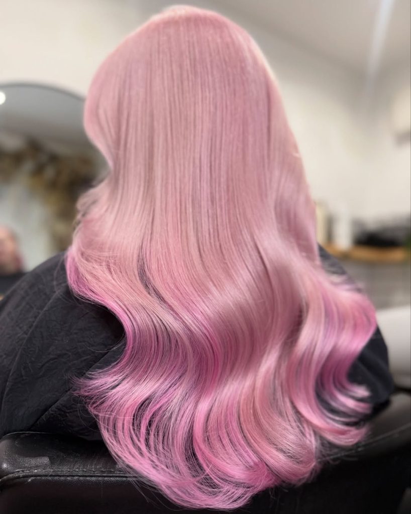 Face-Framing Pink Highlights with Curtain Bangs