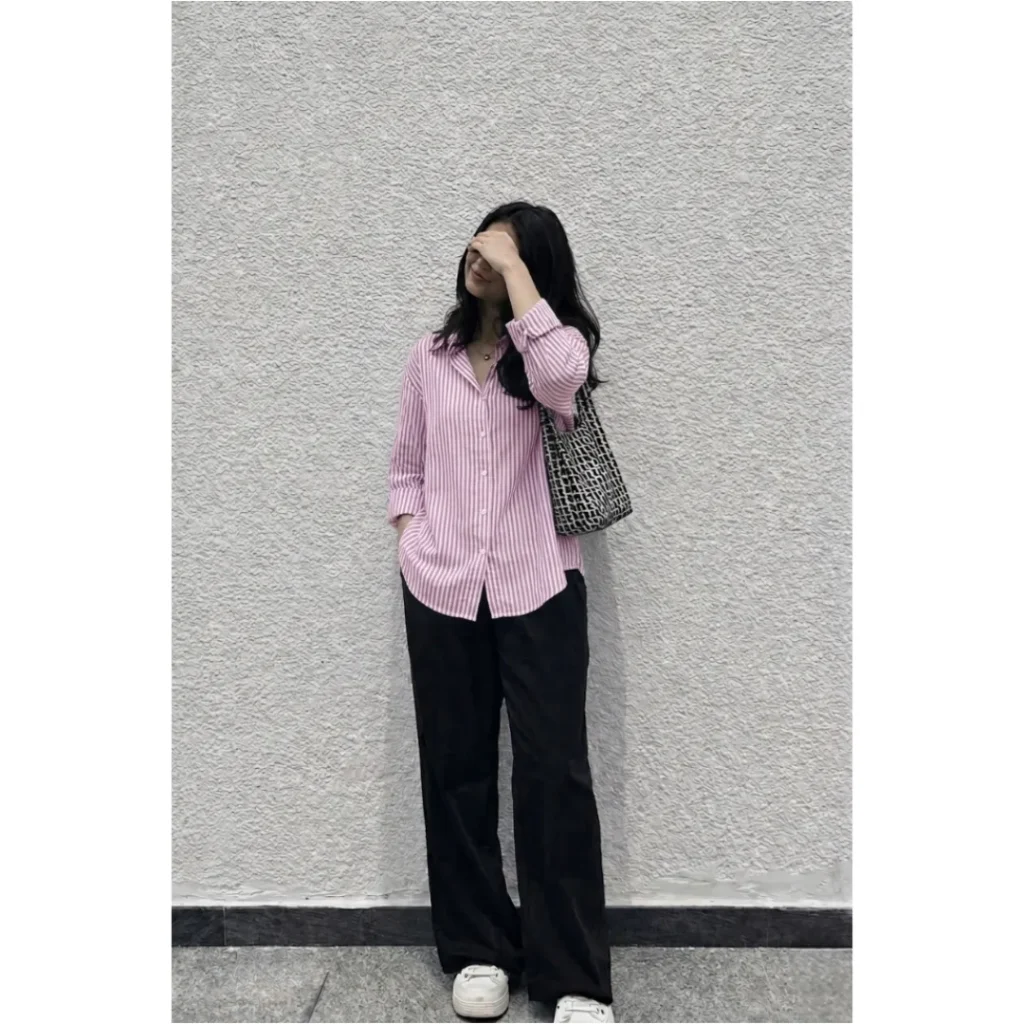 Pink Striped Button-Up Shirt + Black Wide-Leg Trousers + White Sneakers